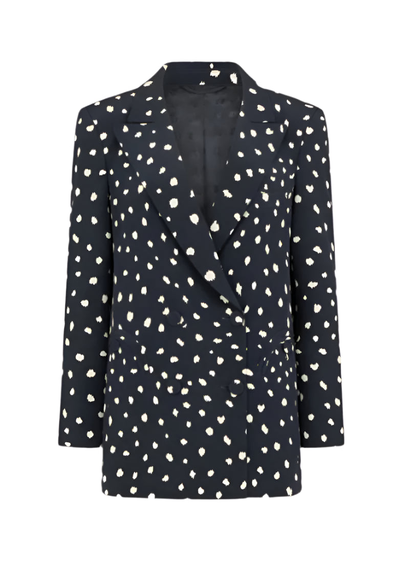 The Mariquita Everyday Blazer by Blaze Milano is a chic black blazer with white polka dots, a classic notched lapel, and long sleeves for timeless style.