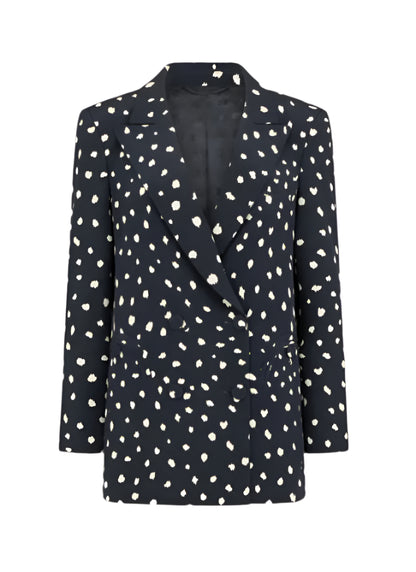 The Mariquita Everyday Blazer by Blaze Milano is a chic black blazer with white polka dots, a classic notched lapel, and long sleeves for timeless style.