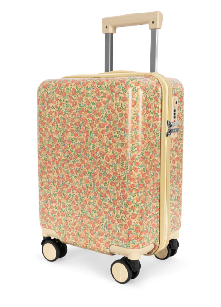 The Konges Slojd Travel Suitcase, by Konges Slojd, is displayed against a plain background. It features a floral pattern, 360-degree spinner wheels, a retractable handle, and includes TSA LOCK®.