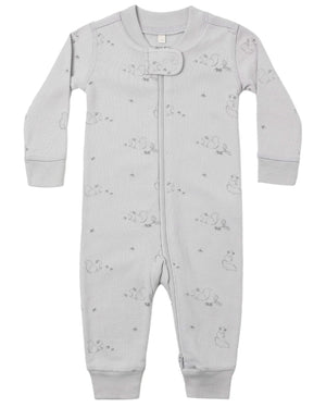 The Quincy Mae Baby Zip Long Sleeve Sleeper is a light grey baby romper crafted from soft organic brushed jersey. It features long sleeves, a front zipper, and a subtle animal print pattern, and is designed with non-slip soles to provide added safety for little ones taking their first steps.