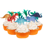 Celebrate in style with the Meri Meri Cupcake Kits from Meri Meri, featuring cupcakes wrapped in vibrant orange, topped with white frosting and finished with playful dinosaur and plant toppers.