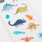 A sheet of Meri Meri Themed Stickers includes mini colorful dinosaurs and leaves, making them perfect for decorating posters or filling party bags.