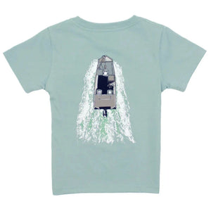 The Boys' On the Water SS Tee by Properly Tied features a light blue design with an overhead graphic of a small boat cutting through the water and leaving a wake behind.