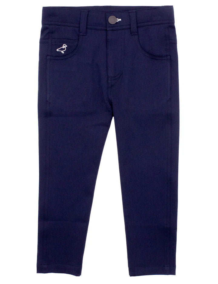 The Properly Tied Boys' Fairway Performance Pant is a pair of navy blue, wrinkle-resistant golf pants for kids with front pockets, a button closure, and a small embroidered duck on the right pocket.
