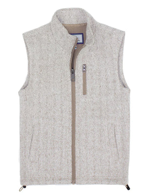 The Properly Tied Boys' Upland Vest features a light grey herringbone pattern, zip-up front, high collar, sleeveless cut, and a vertical zippered chest pocket.