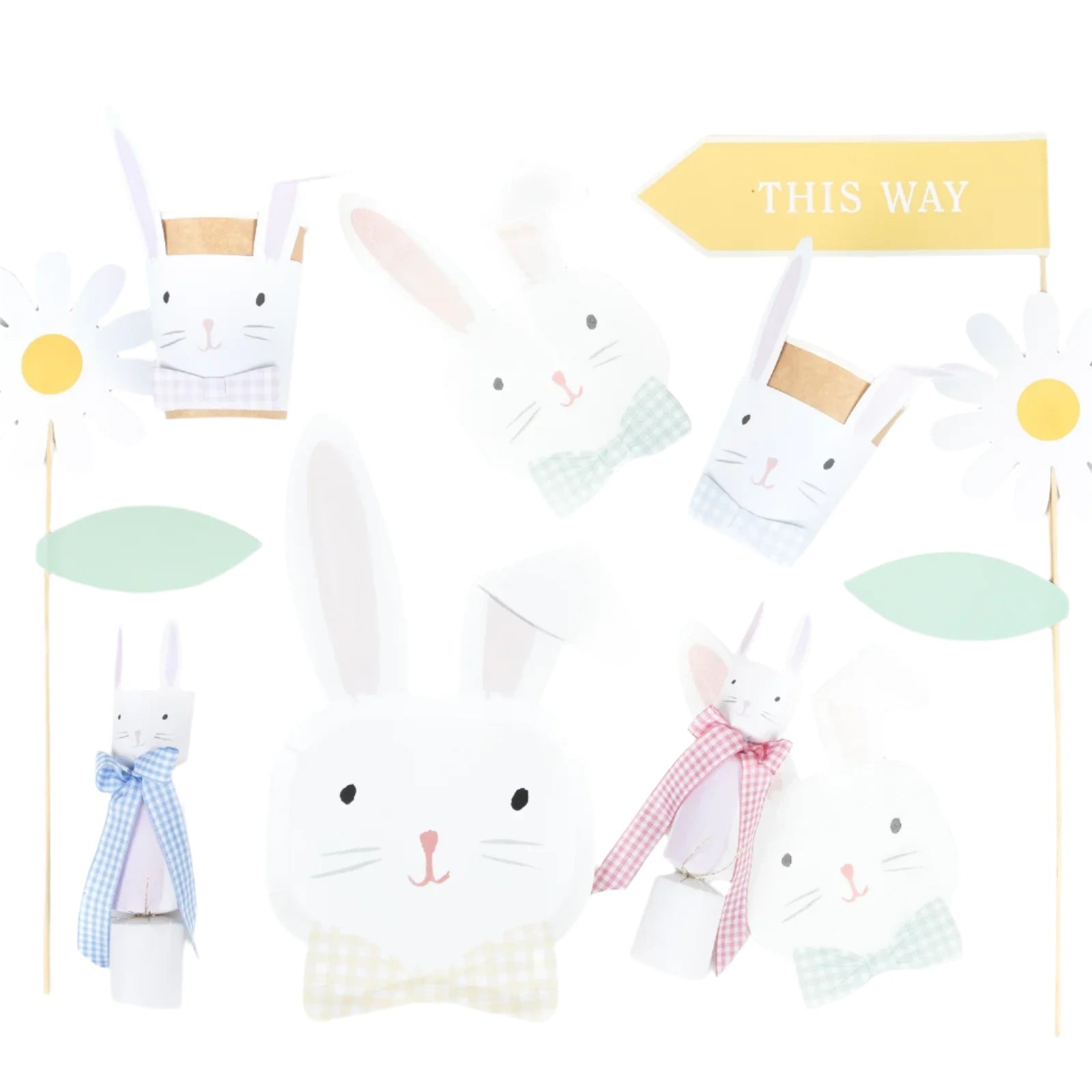 Use Meri Meri's Easter Bunny Napkins with gingham bows and daisies on sticks as decorations. A yellow "This Way" arrow sign completes the perfect whimsical touch for your Easter table.