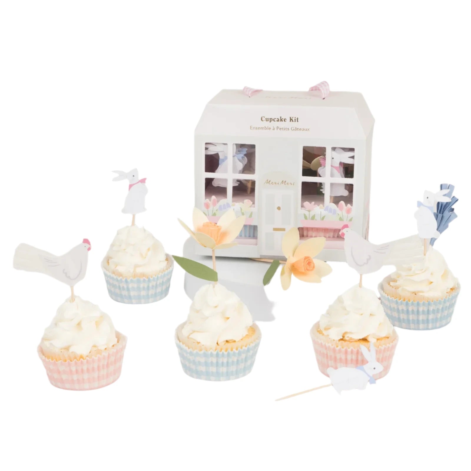 The Easter Cottage Cupcake Kit by Meri Meri includes five cupcakes with birds and flower toppers, all in pastel wrappers, elegantly presented amidst a decorative box.