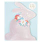 The "Spring Bunny Sticker Book" by Meri Meri features an illustration of a Spring Bunny with a floral wreath around its neck against a pale blue background.