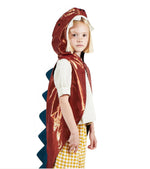 A young child in a Meri Meri Dinosaur Costume with a hooded jacket and tail, looking to the side.