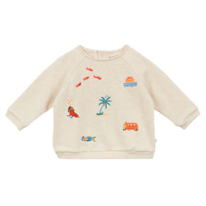 The Baby Faustin Sweatshirt by Arsene & Les Pipelettes is a relaxed, cream-colored children’s sweatshirt featuring colorful embroidered designs like a palm tree, fish, seal, van, sunrise, and a fish in water.