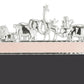 The Michael Aram Animals Nickelplate Frame, 5x7 in pink, features charming silver figures—a lion, elephant, giraffe, zebra, monkey, and rhinoceros—arranged on a rectangular base to inspire children's imagination.