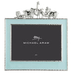 The Michael Aram Animals Nickelplate Frame, 5x7 in blue, features a light blue border with silver animal accents—an ideal way to showcase children’s memories in your cherished collection.