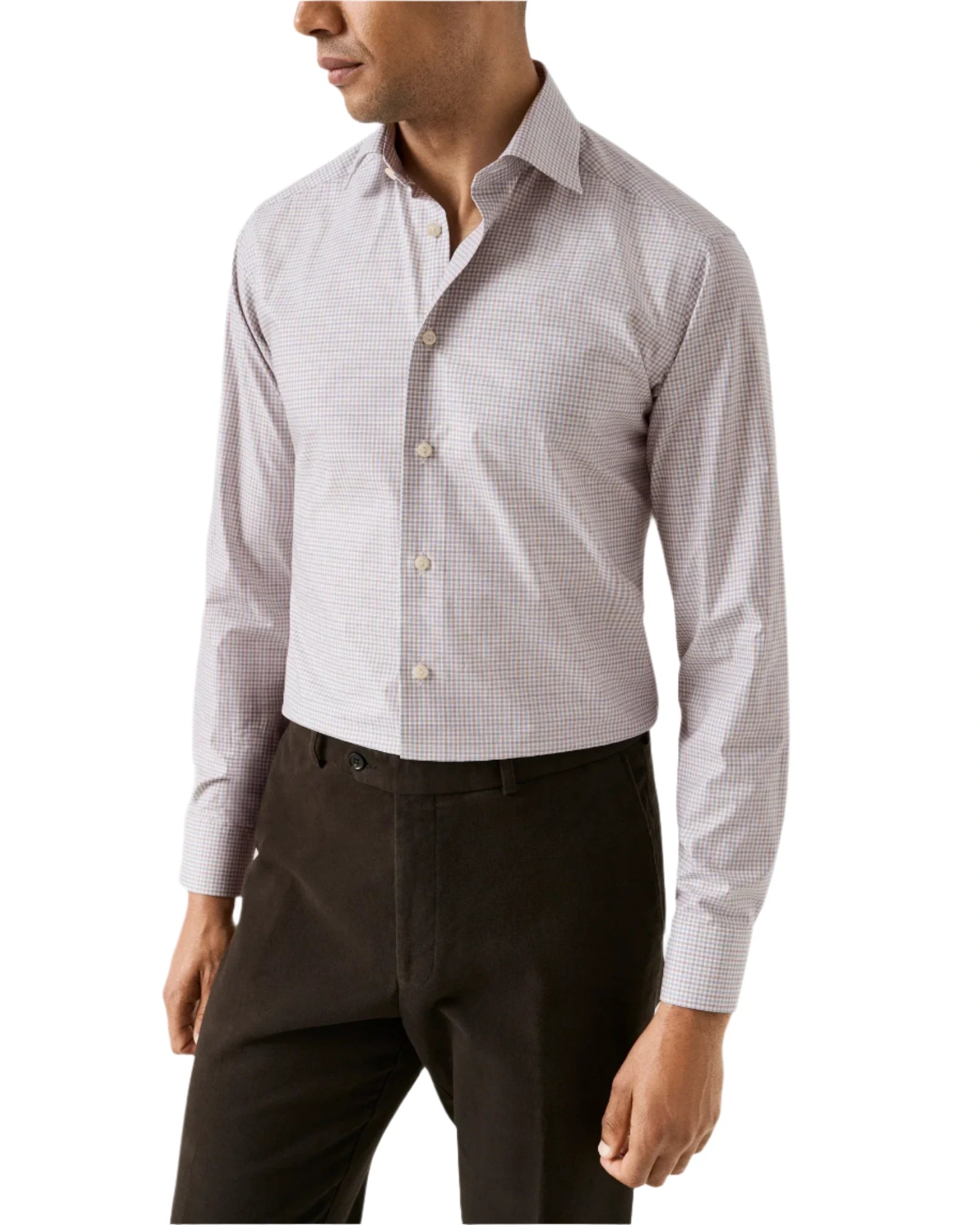 A man wears the Eton Slim Cut Away Micro Check Twill Shirt in light-colored, wrinkle-resistant organic cotton with a subtle micro check pattern and dark trousers, standing against a plain white background.