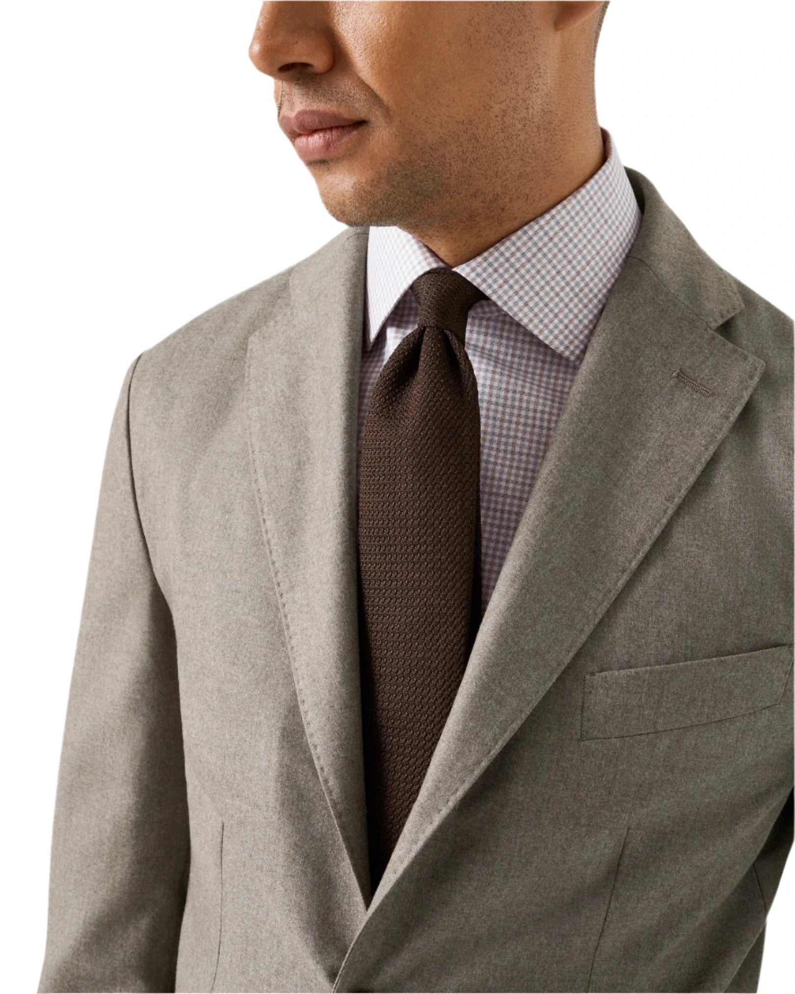 Man wearing a light gray suit jacket, a Slim Cut Away Micro Check Twill Shirt by Eton, and a dark brown textured tie, shown from mid-chest up.