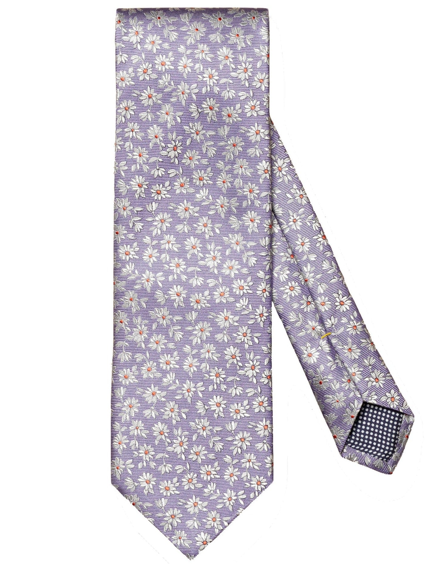 An Eton Silk Tie from Eton, in a light purple color with a white daisy floral pattern and small red accents. The tie features a dark patterned lining on the back, offering a touch of classic style.