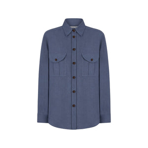The Midday Sun Berber Shirt by Blaze Milano is a long-sleeved blue cotton shirt with a collar and two front chest pockets, shown against a plain white background.