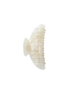 The Midi Heirloom Claw by Machete is a white, iridescent hair claw clip made from premium Italian acetate with a tiled, mosaic-like surface, shown against a plain white background.