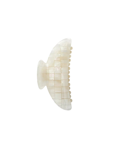 The Midi Heirloom Claw by Machete is a white, iridescent hair claw clip made from premium Italian acetate with a tiled, mosaic-like surface, shown against a plain white background.