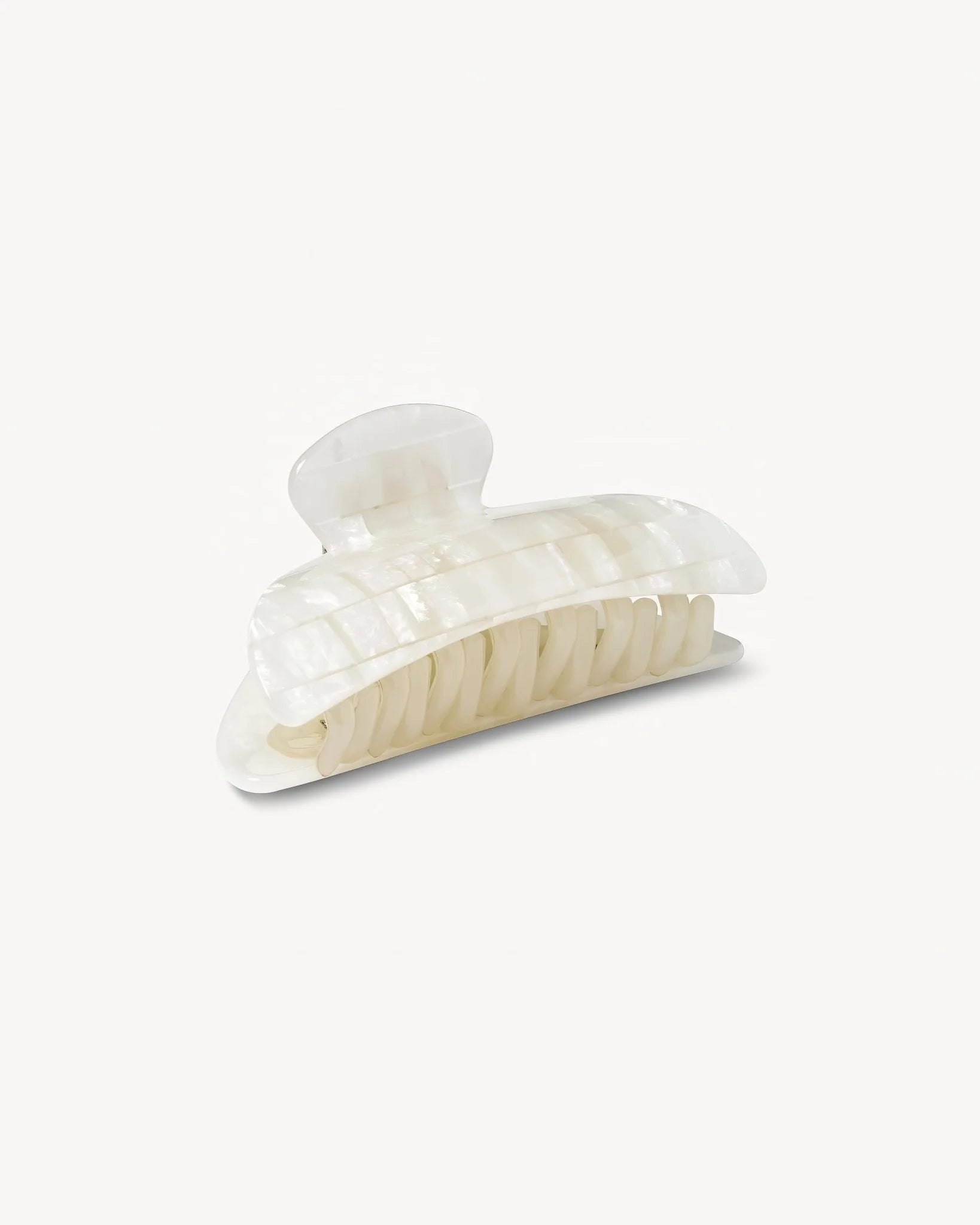 The Midi Heirloom Claw by Machete is a large, ivory-colored hair clip made from Italian acetate with a glossy, marble-like finish and double-walled construction, shown on a plain white background.