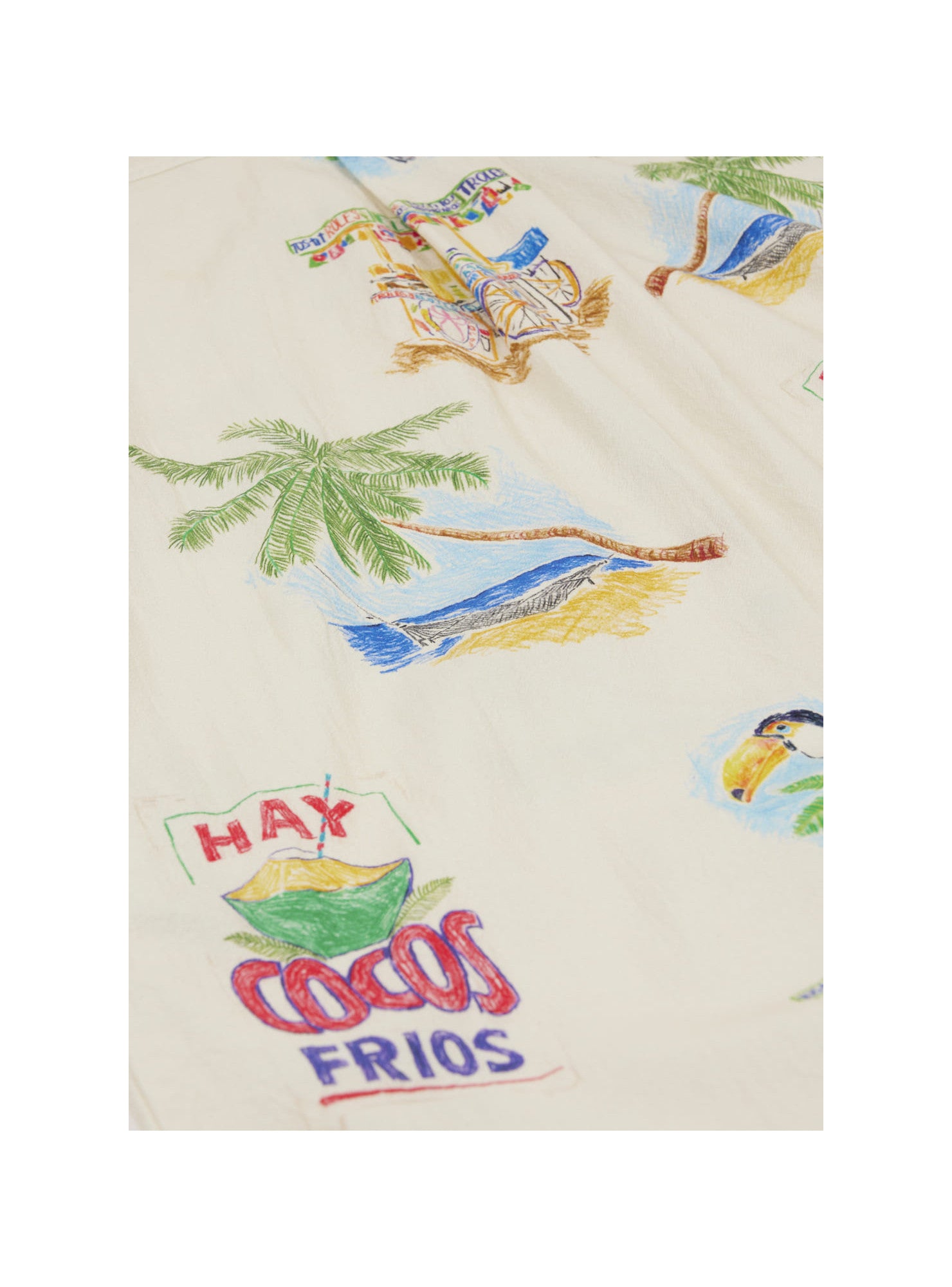 The Baby Mini Coco Jumpsuit by Arsene & Les Pipelettes features a beige fabric adorned with vibrant illustrations of palm trees, a beach scene, and a toucan, along with the playful phrase "HAY COCOS FRIOS" in bold red and blue lettering. This cozy romper is perfect for sunny days and brings a cheerful touch to your little one's wardrobe.