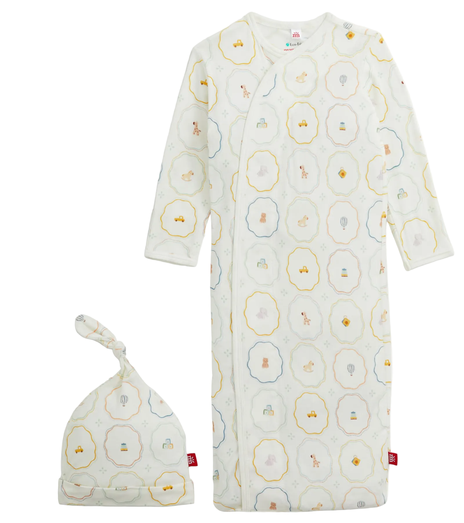 The Magnetic Me Baby Nursery Magic Cream Gown & Hat Set showcases a whimsical print of animals and hot air balloons on a soft cream background, displayed flat. Perfect for newborn comfort, it’s thoughtfully designed for easy diaper changes.