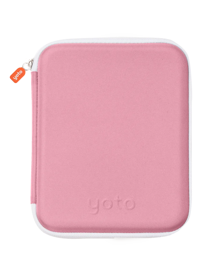 A pink Yoto Card Case by Yoto, featuring a white trim, is shown closed and upright against a plain white background—the ideal accessory to keep your favorite cards organized and protected.