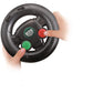 A child’s hands hold a black toy steering wheel featuring a green button, a red button, and black directional arrows—just like the remote included with the Maisto My First RC Jeep Wrangler.