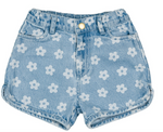The Girls’ Andrea Denim Floral Short by Louis Louise is crafted in light blue denim with a delightful white daisy print, front pockets, rolled hems, and a cheerful yellow button closure. Photographed on a white background, these versatile girls’ shorts are perfect for sunny days and effortless mix-and-match styling.