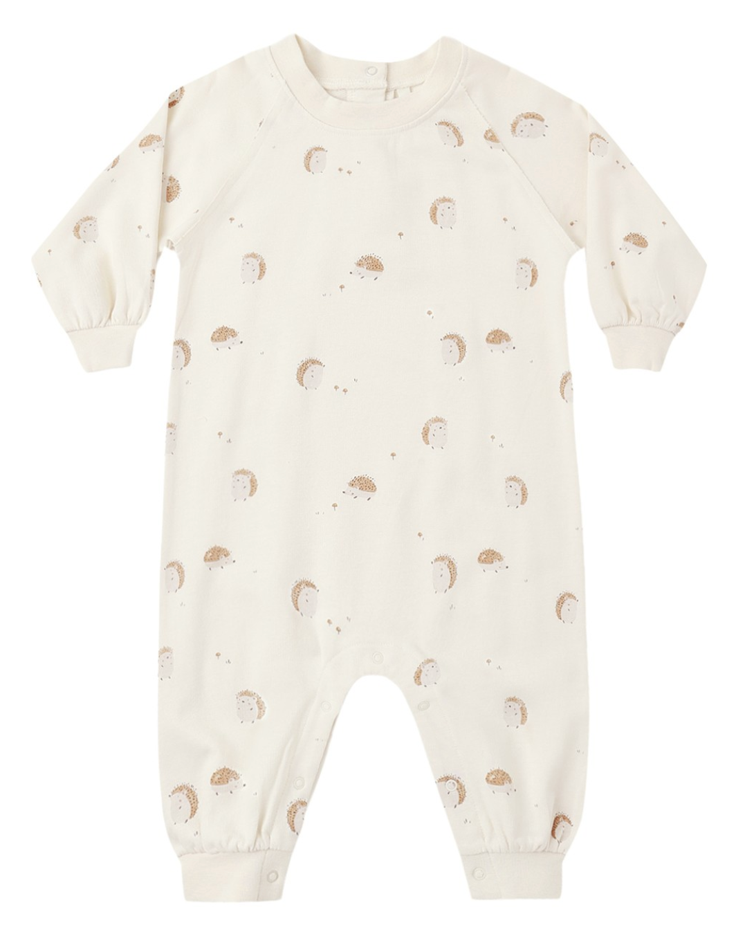 The Rylee & Cru Baby Raglan Jumpsuit is a cream-colored long sleeve romper with legs, adorned with a charming pattern of small hedgehogs and dots. Made from soft French terry, this adorable jumpsuit provides cozy comfort for your little one, making it perfect for everyday wear.