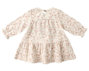 The Quincy Mae Baby Girls' and Girls' Tiered Jersey Dress is a cream long sleeve dress with pink floral print, gathered cuffs, ruffled hem, back button closure, and coordinating bloomers for a charming outfit.