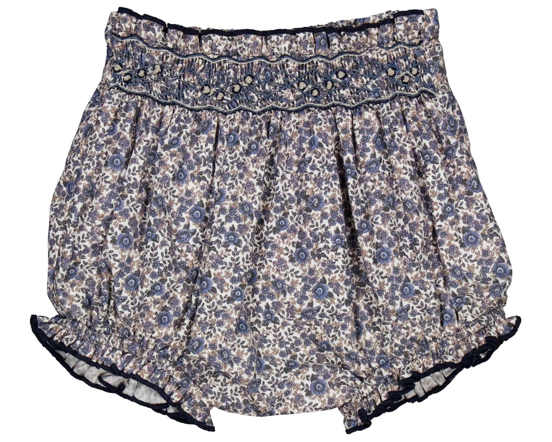The Kidiwi Baby Girls' Myrtille Smocked Bloomer features a navy blue floral print, 100% cotton fabric, an elastic waistband, and delicate smocking at the top.