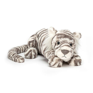 Plush toy tiger with a striped grey and white pattern, resembling the elegant Jellycat Sacha Snow Tiger, Really Big, lying down on a white background.