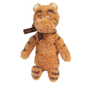 The Kids Preferred Classic Plush Tigger features brown and orange fur, black stripes, and a brown neck tag—perfect for any Winnie the Pooh fan.