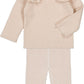 The Louis Louise Baby Girls' Chat Knitted Wool Blend Lurex Leggings feature a beige ribbed knit design, elasticated waistband, and super soft wool blend fabric, perfect for toddlers seeking comfort and style.