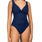 A woman wearing a Karla Colletto Basics Twist Underwire Tank swimsuit designed to support the female form, featuring a v-neckline and gathered detail at the bust.