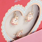 Konges Slojd Jewelery Set with unicorn-themed necklace and earrings, packaged in a heart-shaped box with decorative edging.