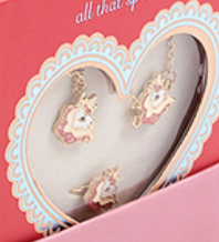 Konges Slojd Jewelery Set with unicorn-themed necklace and earrings, packaged in a heart-shaped box with decorative edging.
