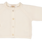 The Kidiwi Baby Girls' and Girls' Ariel Wool Cardigan is a cream, long-sleeved pure wool knit with front buttons—perfect cozy fall/winter wear for babies, shown on a white background.