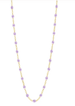 The Classic Gigi Necklace 19.7" by Gigi Clozeau is crafted in 18 carat yellow gold, featuring a stunning gold chain with evenly spaced small lavender beads, embodying striking jewels that elevate any ensemble with timeless elegance.