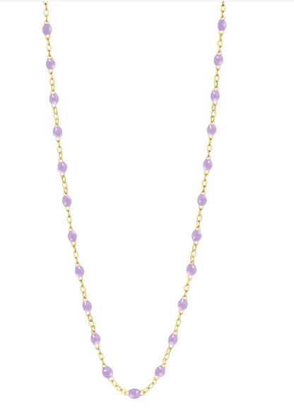 The Classic Gigi Necklace 19.7" by Gigi Clozeau is crafted in 18 carat yellow gold, featuring a stunning gold chain with evenly spaced small lavender beads, embodying striking jewels that elevate any ensemble with timeless elegance.