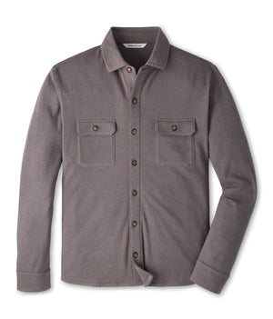 Peter Millar Ridgeline Knit Shirt Jacket in grey, featuring a textured cotton-blend, button-up front, and two chest pockets.