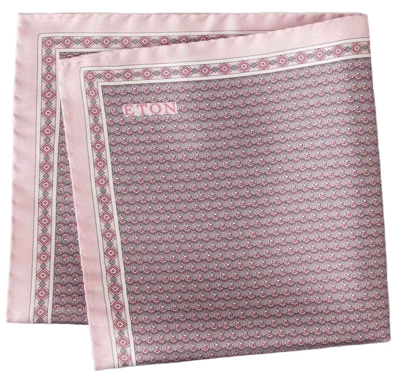 A folded Geometric Silk Twill Pocket Square by Eton in pink, showcasing a hexagonal geometric pattern and the brand name "Eton" in one corner.