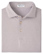 A folded Peter Millar Jubilee Performance Jersey Polo with short sleeves, light thin stripes, a collar, and two buttons, known for UPF 50+ protection and performance fabric.