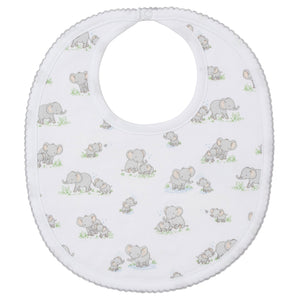The Kissy Kissy Elephant Esprit Printed Bib is crafted from soft Pima cotton and features gray elephants—standing and sitting—amid green grass with blue accents.