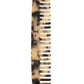 The Machete Comb No. 3 is a travel-sized, wide-tooth comb made from Italian bio-acetate in a tortoiseshell pattern, featuring the brand's engraved "MACHETE" logo on the side.