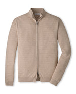 Peter Millar Pacific Full Zip Sweater in a beige breathable pima cotton knit, featuring a mock neck and ribbed horizontal texture.