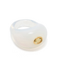 Introducing the Lizzie Fortunato Monument Ring, a stunning piece with a glossy white finish and smooth surface, akin to hand-blown glass cocktail rings. It features a gorgeous yellow gemstone set in an elegant gold bezel.