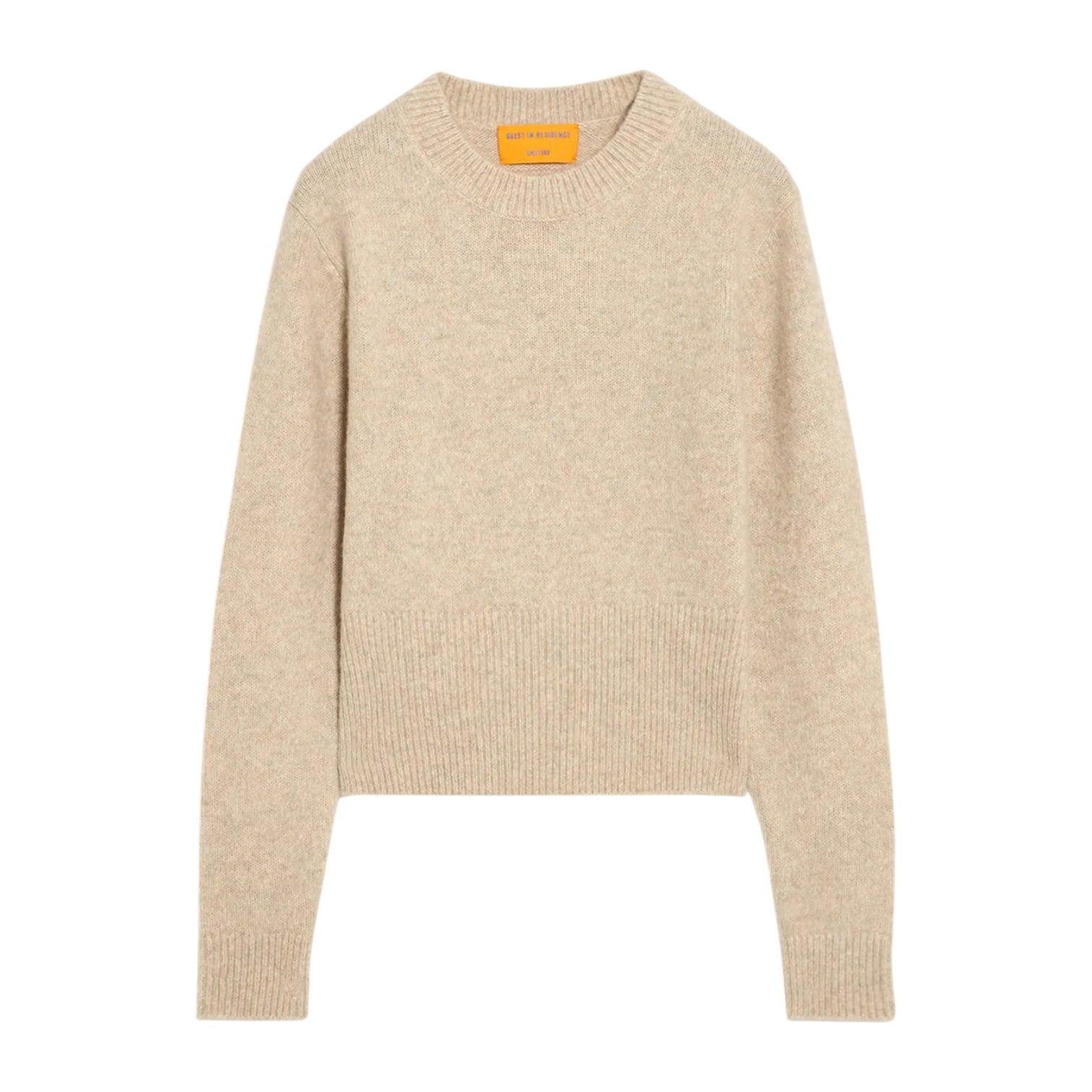 The Alina Cashmere Crew by Guest in Residence is a beige, long-sleeve marled knit sweater with a crew neckline and ribbed cuffs, hem, and collar, shown flat on a white background.
