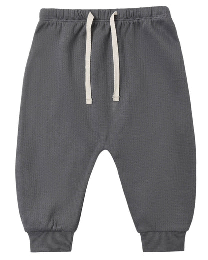 Quincy Mae Baby Boys’ and Boys’ Sweatpant in gray, featuring an elastic waistband, white drawstring, and ribbed cuffs, laid flat on a white background.