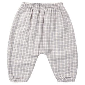 Quincy Mae Baby Boys’ and Boys’ Woven Pant in gray and white plaid, designed with an elastic waistband and gathered ankles, shown laid flat on a white background for a relaxed fit look.